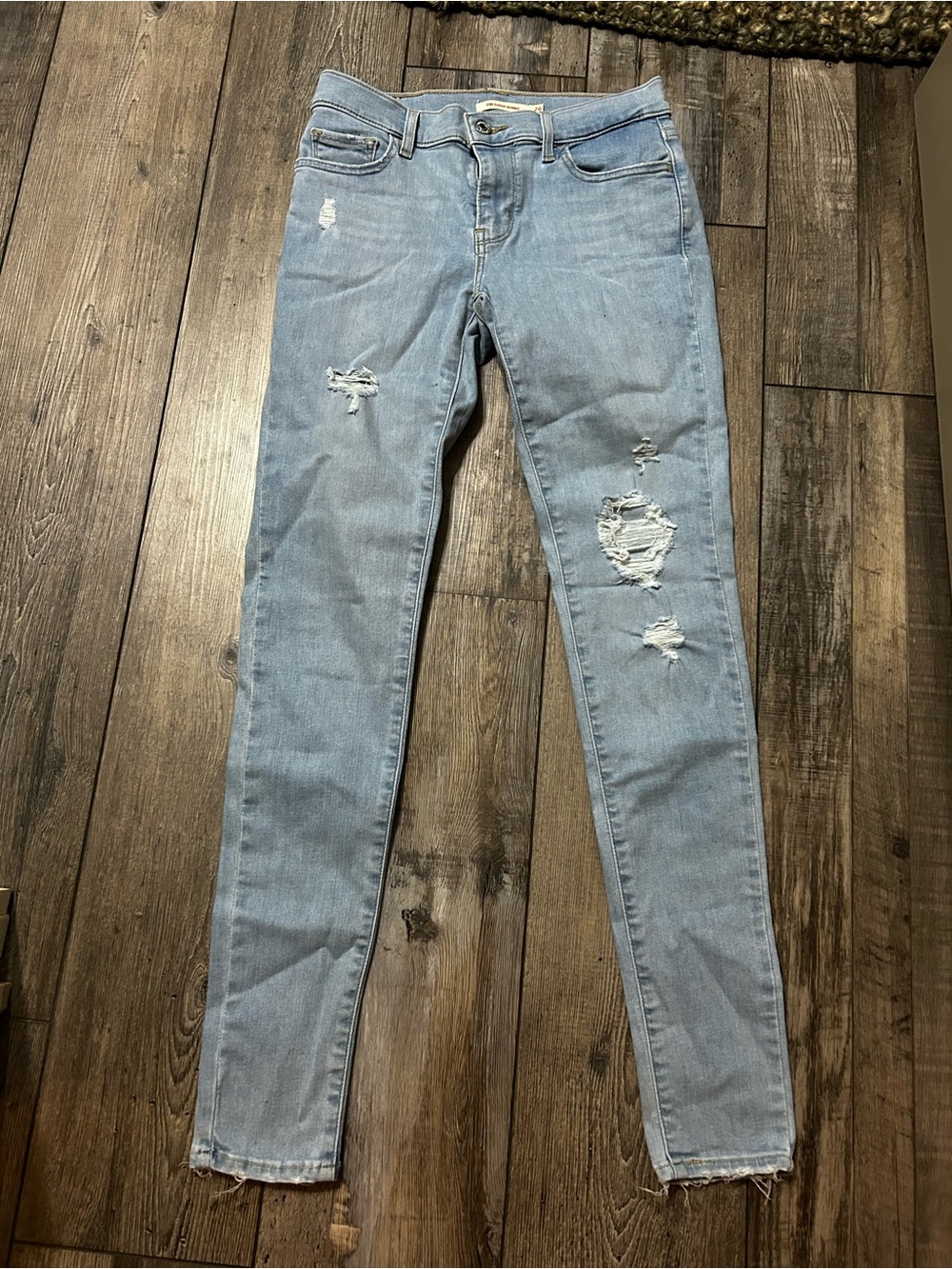 710 Levi’s super skinny Light Blue Wash Distressed Skinny Jeans